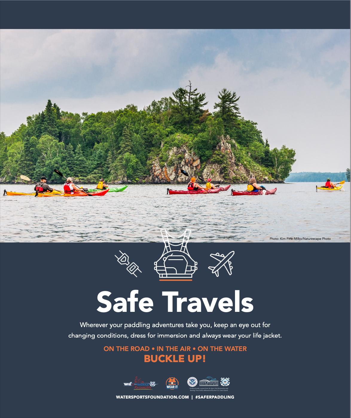 Royalty-free image - A group of kayakers paddles on a calm lake surrounded by lush green trees and rocky cliffs. The image includes safety messages about paddling with a logo of the Water Sports Foundation at the bottom.